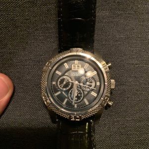 Men’s black Guess watch